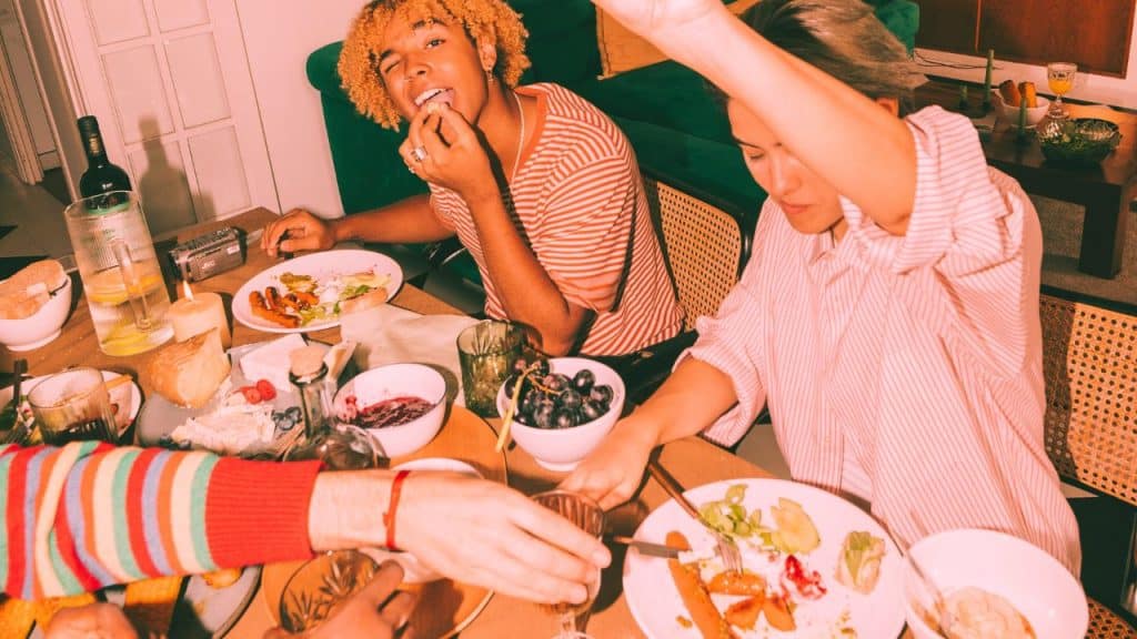 A sober man eats thanksgiving dinner with friends