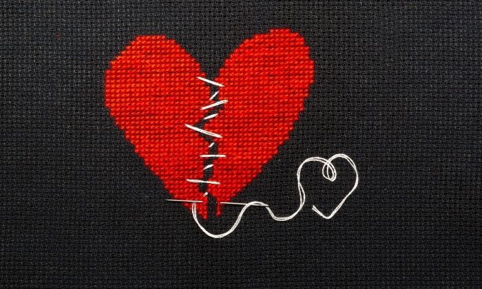 stitched together heart symbolizing self forgiveness