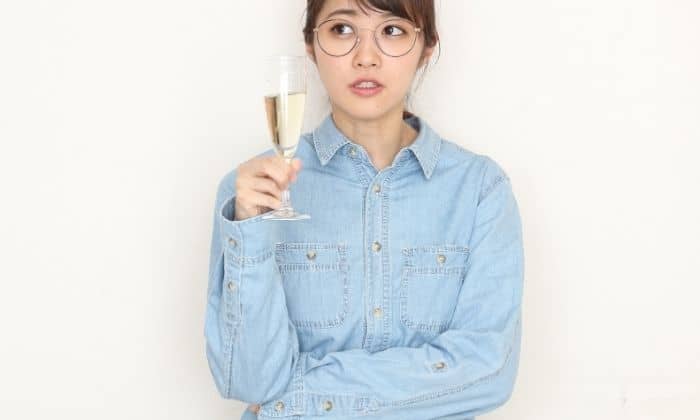 california sober woman with a glass of wine