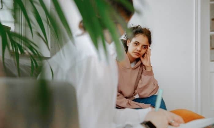 woman talking in a therapy session