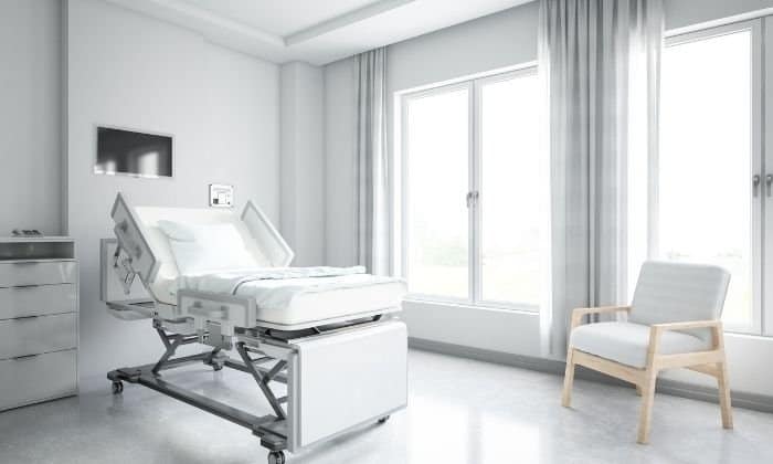 empty hospital bed and room