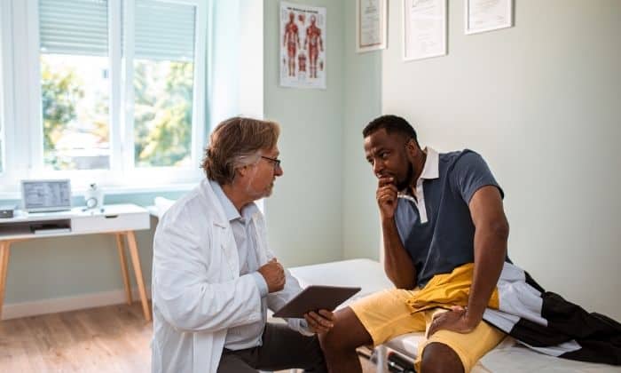man speaks with his doctor about anxiety medication
