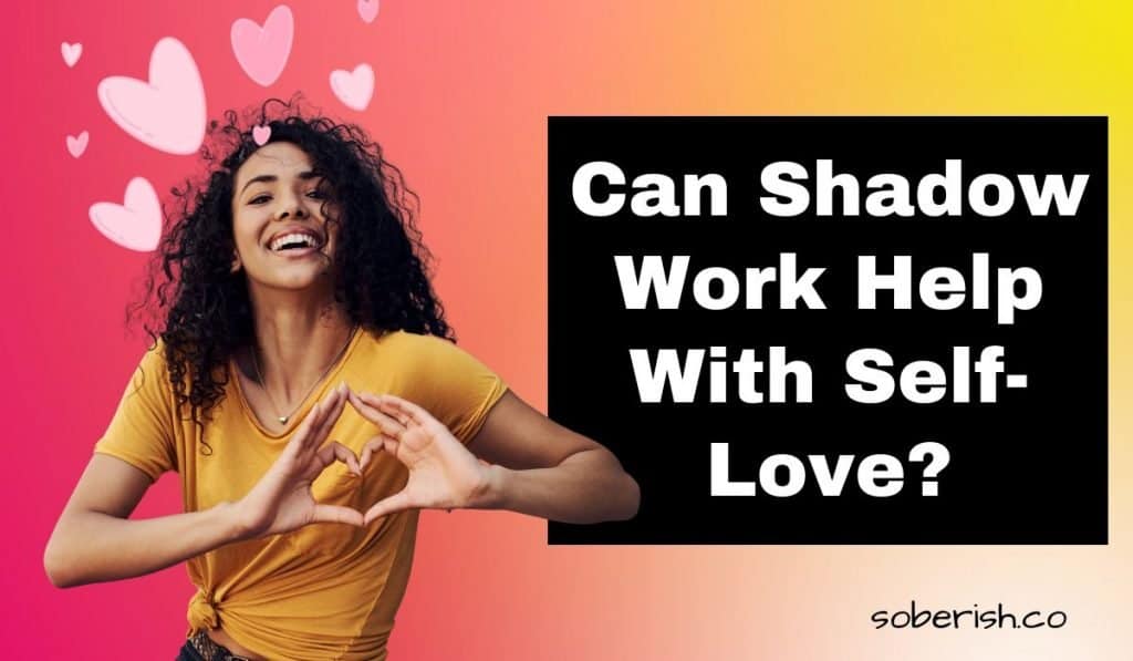 A beautiful girl with curly hair forms a heart shape with her hands over her chest. She is smiling and has graphic hearts crowning her head. The title reads Can Shadow Work Help With Self-Love and the URL reads soberish.co