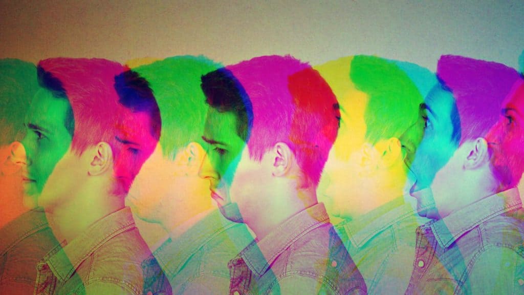 A multi-colored layered image of a man who is cycling through various alcohol-induced mood swings